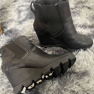 Sorel Black slip on wedges. Size 8. Runs big. Great condition!